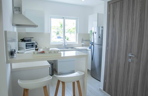 Bavaro Apartment | Perfect & Comfy Pool View Apartment with Beach Access, Balcony, Wi-Fi, AC & TV
