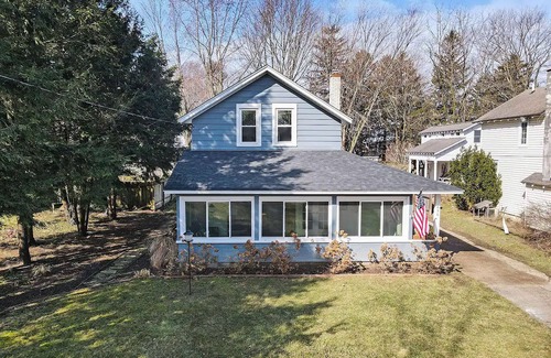 Macatawa House | Perfect Gathering Spot with a Fire Pit, Adirondack Chairs, Hammocks & Kayaks, Near Lake and Beaches