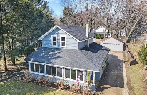 Macatawa House | Perfect Gathering Spot with a Fire Pit, Adirondack Chairs, Hammocks & Kayaks, Near Lake and Beaches