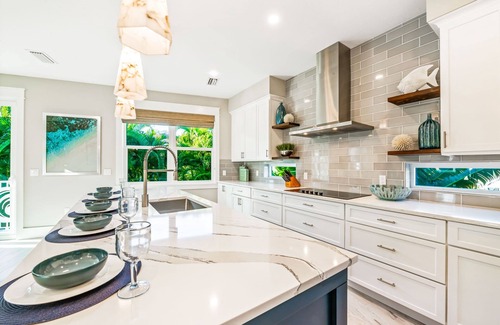 Siesta Key Village House | Perfect Location. Roof Top Deck. Gulf Views. Heated Pool/Spa w/Rain Curtain