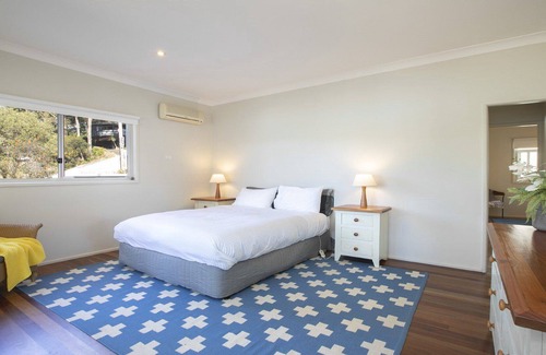 Hardys Bay House | Perfect NE aspect for sunny winter days and a fireplace at night