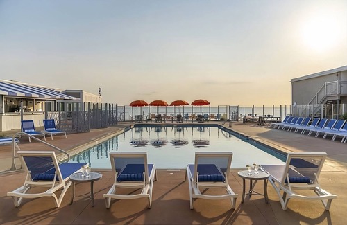 Silver Beach Hotel | Perfect Spot for Soaking Up Some Sun! Private Beach, Onsite Pools and Parking!