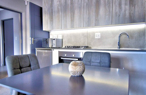 Pringle Bay Apartment | Perfect two bedroomed family unit with a fully equipped kitchen and living area