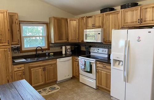 Colington Cottage | Perfectly situated in KDH;Game room downstairs, outdoor fire pit; Lrg front deck