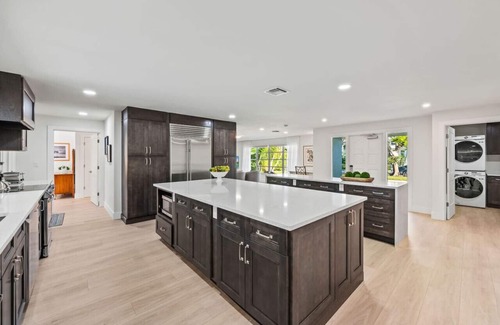 Moorings House | Pesaro Vacation Rental: Stylish 3-BR Retreat Near Via Miramar Beach. Renovated Home with Private Pool, Lush Gardens and Modern Comforts. Perfect for Families, Close to Beaches and Downtown Naples!