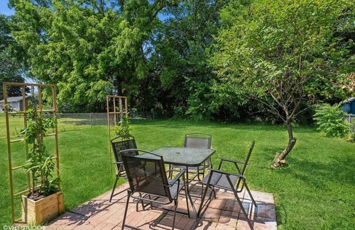 Greater South Side House | Pet & family friendly 4-bedroom house, sleeps 10. Close to DSM Airport!