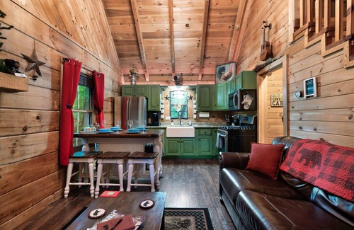 Sevierville Cabin | Pet Friendly! 3 Decks, Hot Tub, Fire Pit, Games, Views
