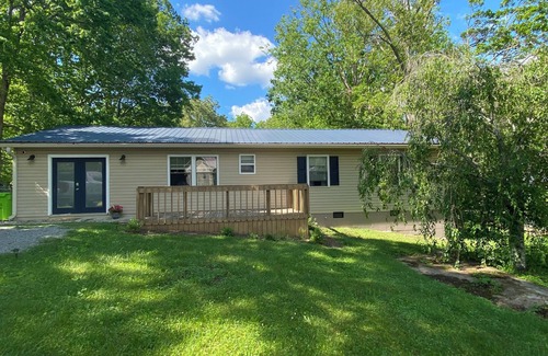 Crossville House | Pet friendly creek home at Crossville with fire pit and fully fenced yard!