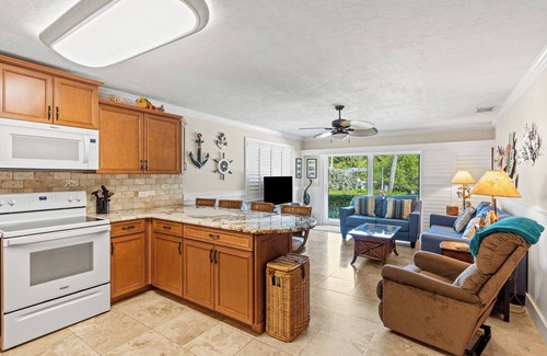 Marathon Apartment | Pet-friendly Duplex unit with pool, cabana, grill, and waterside views!