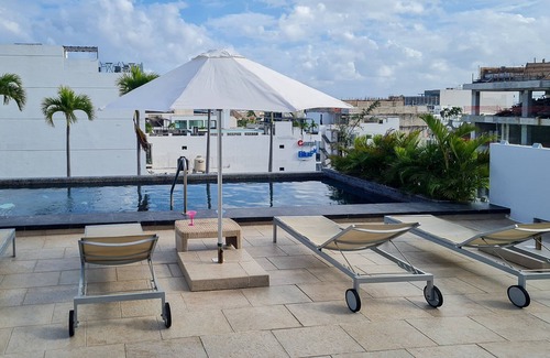Luis Donaldo Colosio Condo | Pet-Friendly! Fast Wi-Fi, AC & Rooftop Pool!