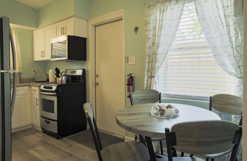 Cocoa Beach House | Pet friendly fenced yard, 4 minute walk to the beach. Close to restaurants