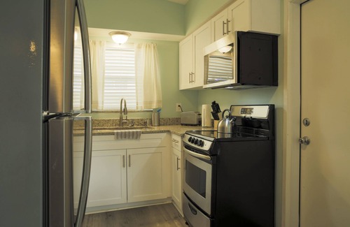 Cocoa Beach House | Pet friendly fenced yard, 4 minute walk to the beach. Close to restaurants