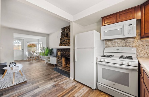 Peach Lake House | Pet Friendly Lake Cottage w/Fireplace & Fire Pit W/D