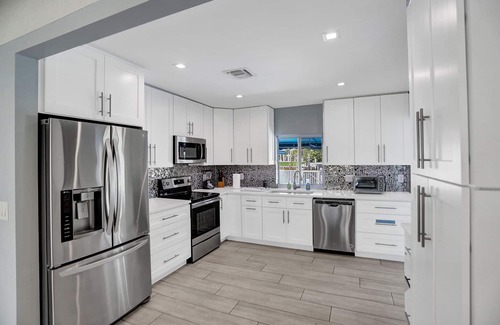 Deerfield Beach House | Pet Friendly Oceanfront Home Heated Pool & Boat Dockage Short walk to Beach