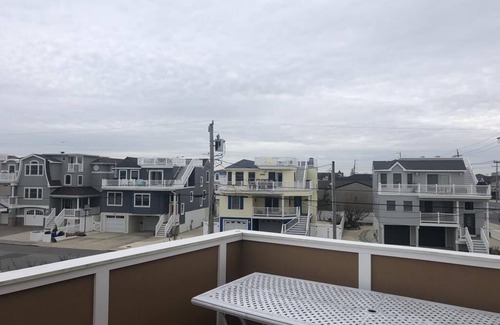Ship Bottom House | Pet friendly. Ocean Block. Ship Bottom. Beach Badges. Beach equipment. Elevator. Game room. Roof top deck. Private yard. Three lower level bedrooms. Walk to everything Ship Bottom has to offer! Pizza; ice cream; mini-golf; adult libations; etc.