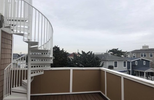 Ship Bottom House | Pet friendly. Ocean Block. Ship Bottom. Beach Badges. Beach equipment. Elevator. Game room. Roof top deck. Private yard. Three lower level bedrooms. Walk to everything Ship Bottom has to offer! Pizza; ice cream; mini-golf; adult libations; etc.