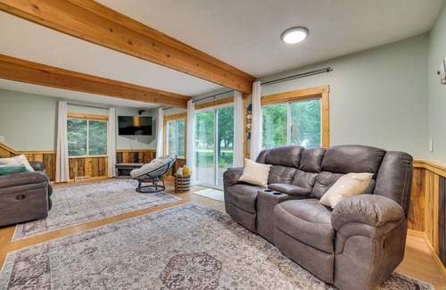 Prudenville Cottage | Pet-Friendly Prudenville Getaway w/ Fire Pit!