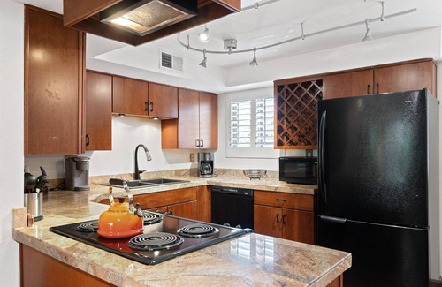 South Scottsdale Condo | Pet-friendly tropical old town Scottsdale home with community pool, and patio!