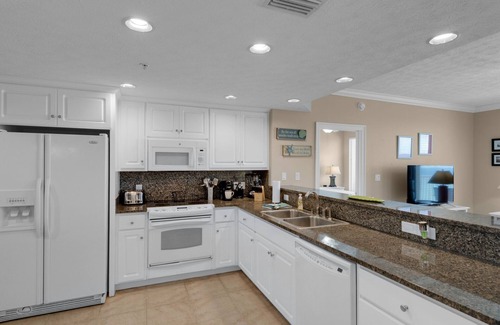 Lower Grand Lagoon Condo | PET FRIENDLY-POOLSIDE CAFE-HOT TUB- GRILL-BEACH FRONT VIEW!