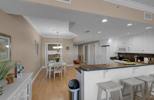 Lower Grand Lagoon Condo | PET FRIENDLY-POOLSIDE CAFE-HOT TUB- GRILL-BEACH FRONT VIEW!