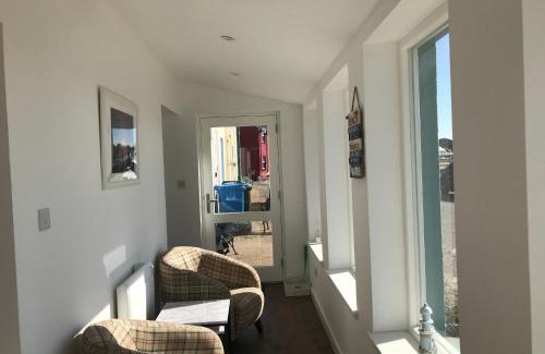 Portmahomack House | PetFriendly-Beachfront-SunsetFacingSunPorch-Garden
