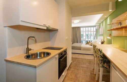 Ampelokipoi Apartment | Phaedrus Living: The Emerald Studio