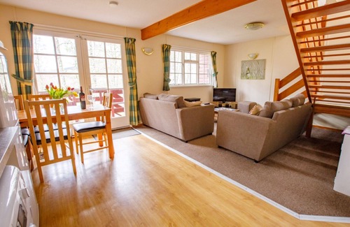 Tomich Ski Chalet | Pheasant Lodge - a woodland lodge that sleeps 6 guests in 3 bedrooms