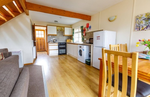 Tomich Ski Chalet | Pheasant Lodge - a woodland lodge that sleeps 6 guests in 3 bedrooms