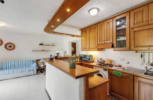 Porto San Paolo Apartment | Piazzetta Villa Pieds Dans L’eau, Porto San Paolo, Italy