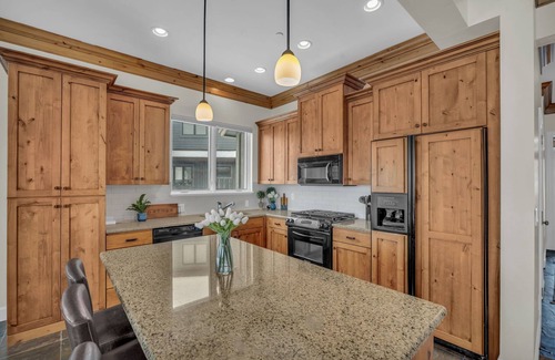 Eden House | Picturesque family retreat. 8 bedrooms, 2 game rooms, large deck, & fire-table.