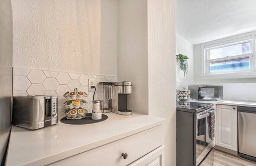 Central Colorado Springs Apartment | Pikes Charm! Apartment w/Arcade, BBQ & Fire Pit