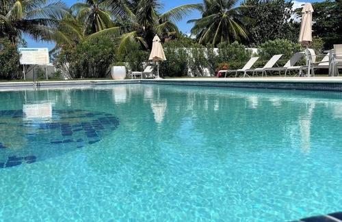 Quisqueya Apartment | PLAYA CORAL nCozy 2-bedroom apartment in charming Playa Juan Dolio with WiFi, AC