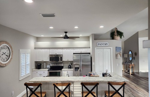 Falcons Glen House | PLAYERS CLUB at Lely Resort! Home with NEW heated salt water pool on golf course