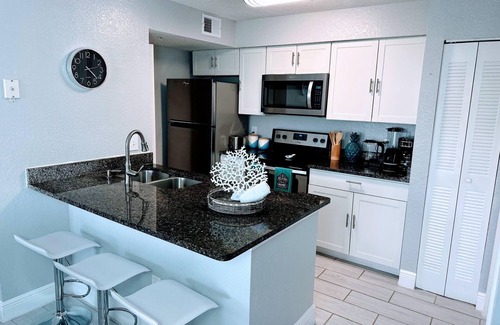 Venetian Bay Villages Condo | Playing Hooky – Modern 2 BDR 9 Miles to Disney w/Community Pool & More