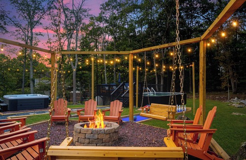 East Stroudsburg House | Pocono Dream House! Heated Pool, Fire Pit, Bowling, Mini Golf!