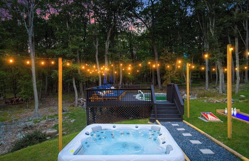 East Stroudsburg House | Pocono Dream House! Heated Pool, Fire Pit, Bowling, Mini Golf!
