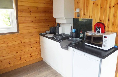 Trowse Newton Cabin | Pod 3 with Countryside view and Hot Tub