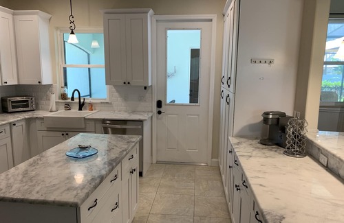 Edgewater House | Pool home overlooking River with NEW private pickle ball court!