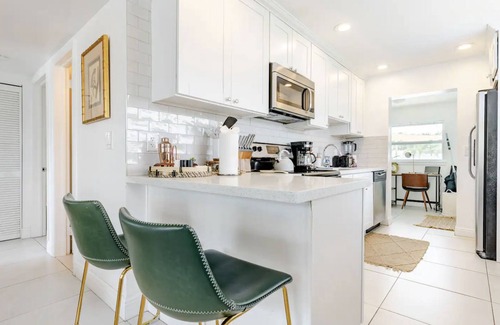Lake Worth Cottage | Pool, Hot tub, 5 min to beach! The Monkey Cottage!