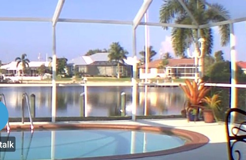 Punta Gorda House | Pool house on a lagoon with sunset view