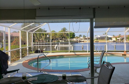 Punta Gorda House | Pool house on a lagoon with sunset view