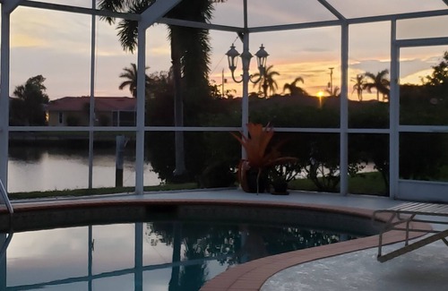 Punta Gorda House | Pool house on a lagoon with sunset view