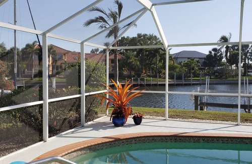 Punta Gorda House | Pool house on a lagoon with sunset view
