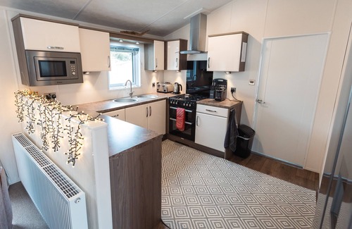 Mudeford House | Pool Lodge - A spacious lodge close to the pool on Sandhills Holiday Park