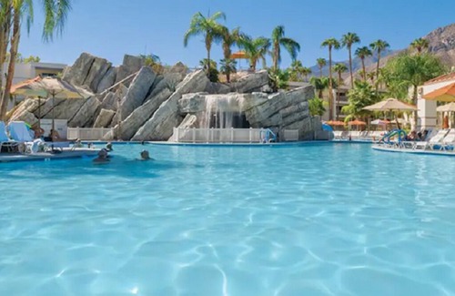 Canyon Corridor Condo | POOL! PALMS! PARADISE! 2 BD! POOLSIDE BAR n' GRILL!