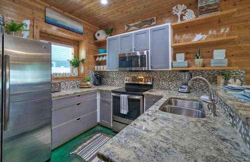 Cinnamon Shore House | Pool, Patio, Blocks to the Beach | Golf Cart Zone | Daiquiri Daze by AvantStay
