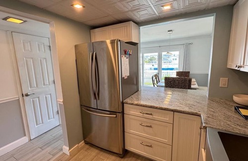 North Beach Haven Condo | Pool. Smart TV. WiFi. Beach Badges. Beach Chairs Patio.O/S. W/D. 140155