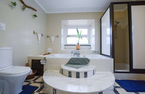 Ribeira Grande House | Pool suite with marble bath in exotic fruit orchard