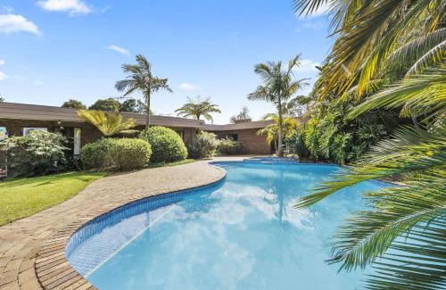 Rosebud House | Poolside Palms Oasis
