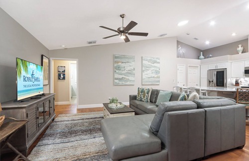 Cypress Lake House | Poolside Paradise is a luxurious modern home in the popular community of Parker Lakes